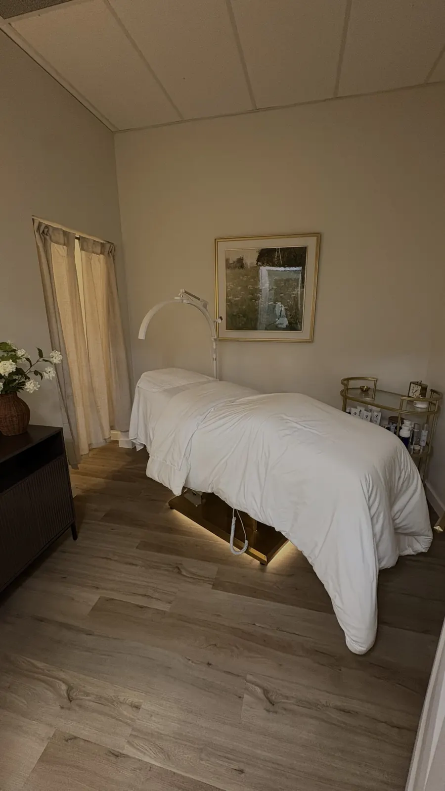 A private consultation and facial room at GLO Aesthetics + Wellness Lounge in Ocala